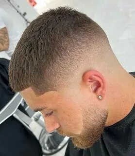 This image shows the buzz cut as the recommendation for gym hairstyles.