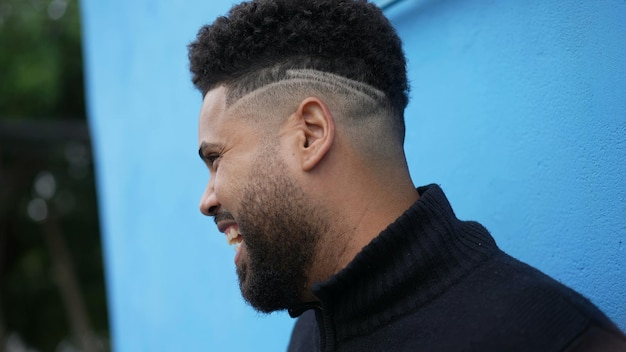 This image shows the temple fade hairstyle on a man to understand the look.