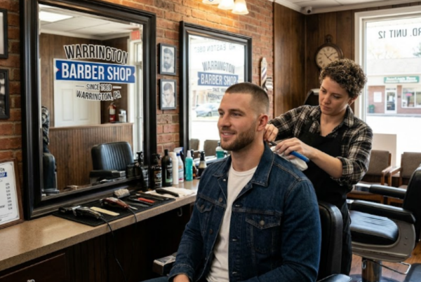 A man with a clean and trendy short haircut at Warrington Barber Shop